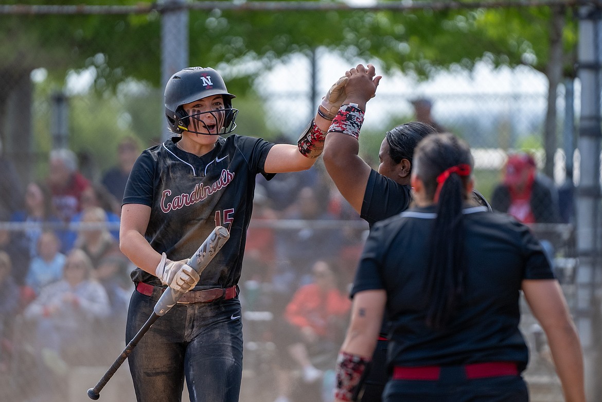North Idaho College freshman Kaylee Vieira celebrates after scoring a run in the second inning of Friday's win over Lower Columbia in the quarterfinals of the Northwest Athletic Conference tournament at Delta Park in Portland on Friday.