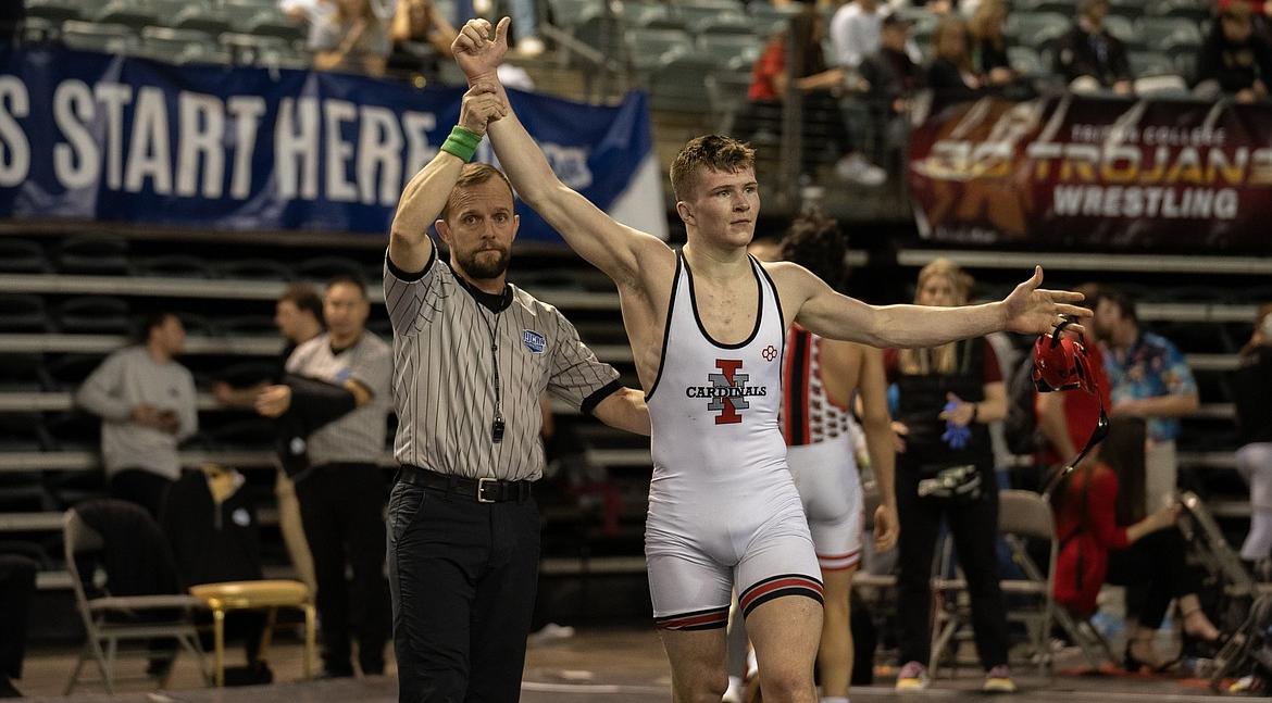 North Idaho College North Idaho College freshman Porter Craig has his hand raised after finishing third in the 157-pound class at the NJCAA Championships on Saturday at the Mid-American Center in Council Bluffs, Iowa.