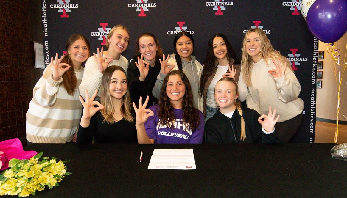 Volleyball players celebrate LOI signing with College of Idaho for Jessie Stires.