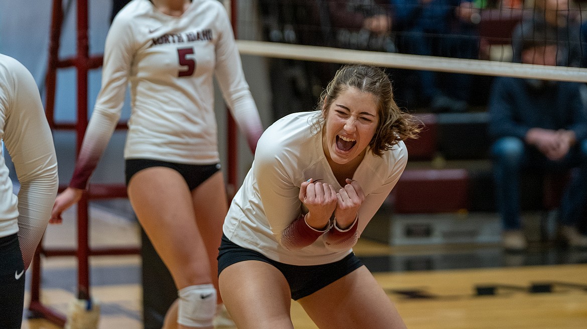 North Idaho College's Rylee Hartwig, a sophomore from Post Falls High, celebrates after the Cardinals' four set win over Highline in the Northwest Athletic Conference East Bracket championship match at Christianson Gymnasium on Sunday.